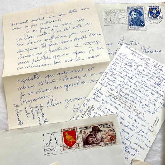 Set of 5 French handwritten letters with envelopes from the 1950s, featuring blue ink script and vintage postage stamps.