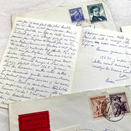 1950s French handwritten letters and envelopes set with vintage stamps from Austria and France. Personal correspondence.