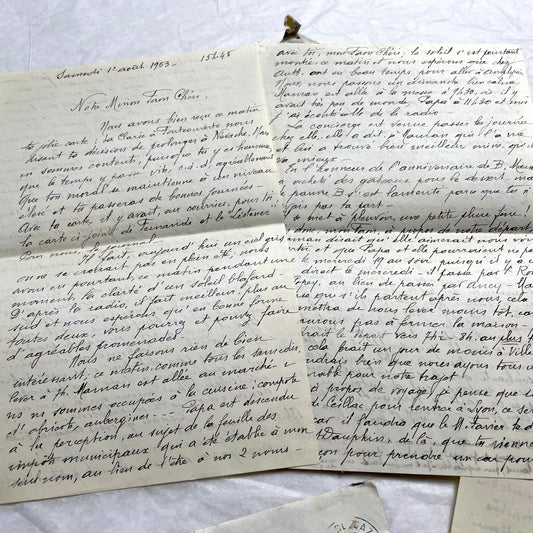 Set of 1950s French handwritten letters with original envelopes and vintage stamps, showing personal correspondence.