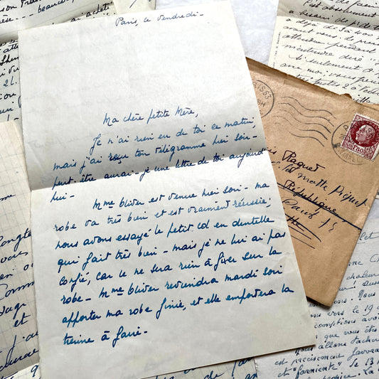 1940s French handwritten letters collection with stamps and postmarks, showing elegant blue ink script on paper.