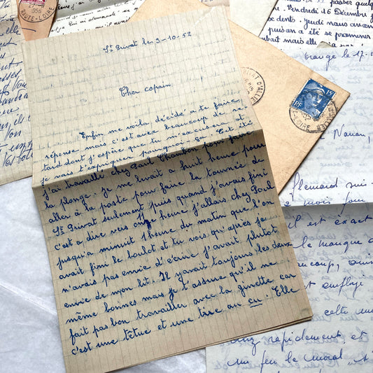 1950s French letters set with original envelopes, handwritten script, vintage stamps, and postmarks visible.