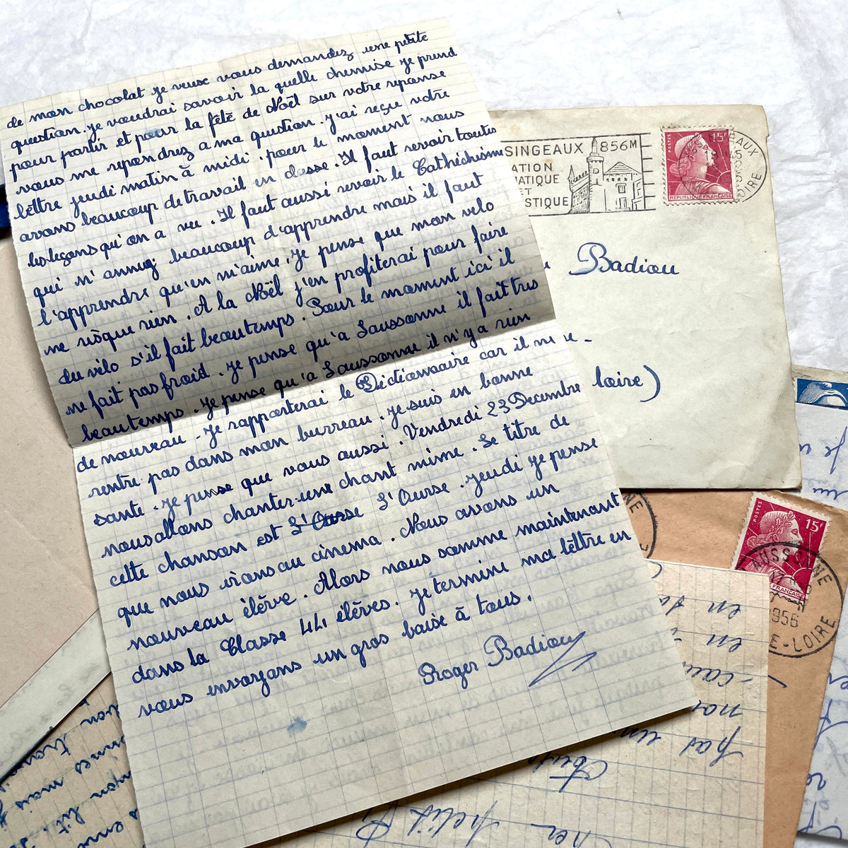 1950s French letters set with original envelopes, handwritten script, vintage stamps, and postmarks visible.