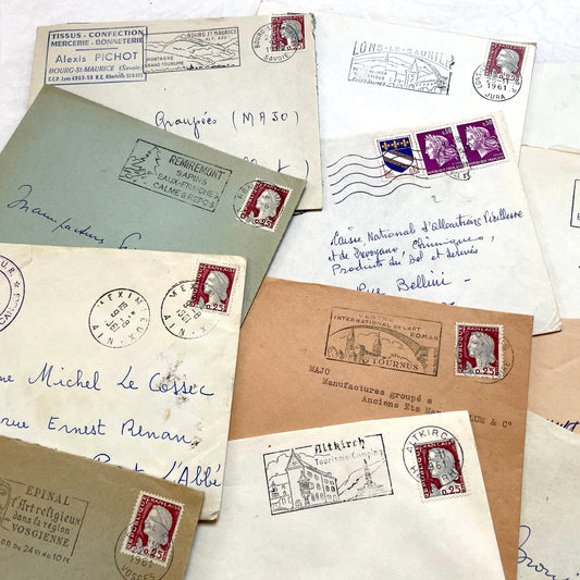 Lot of 20 1960s French envelopes with original stamps and diverse postmarks, showing various city letterheads.