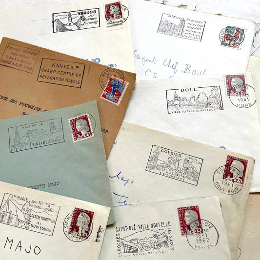 A lot of 20 French envelopes from the 1960s, featuring various postmarks, stamps, and handwritten addresses.