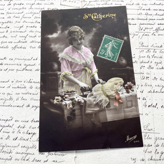 1910s - French Hand-Colored Sepia Postcard - Young Woman Ironing - Vintage Domestic Life Collectible - 'Ste Catherine' Card by Mesange