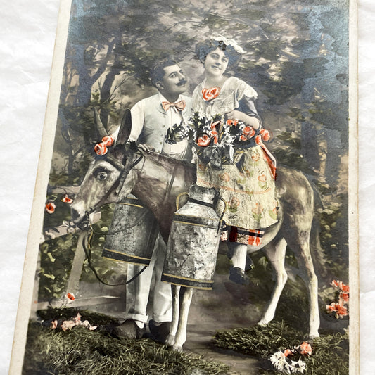 1910s - French Hand-Colored Romantic Postcard - Young Couple On Donkey With Milk Cans And Flowers - Charming Pastoral Market Scene