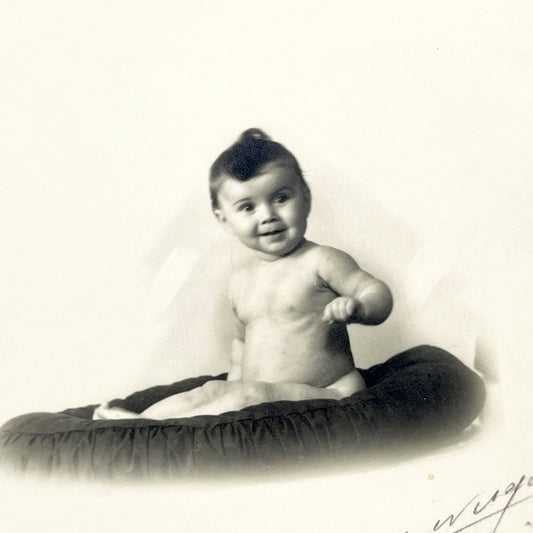 1900s - Vintage Black and White Baby Portrait - Charming Studio Photography - Adorable Infant on Cushion - Early 20th Century Childhood