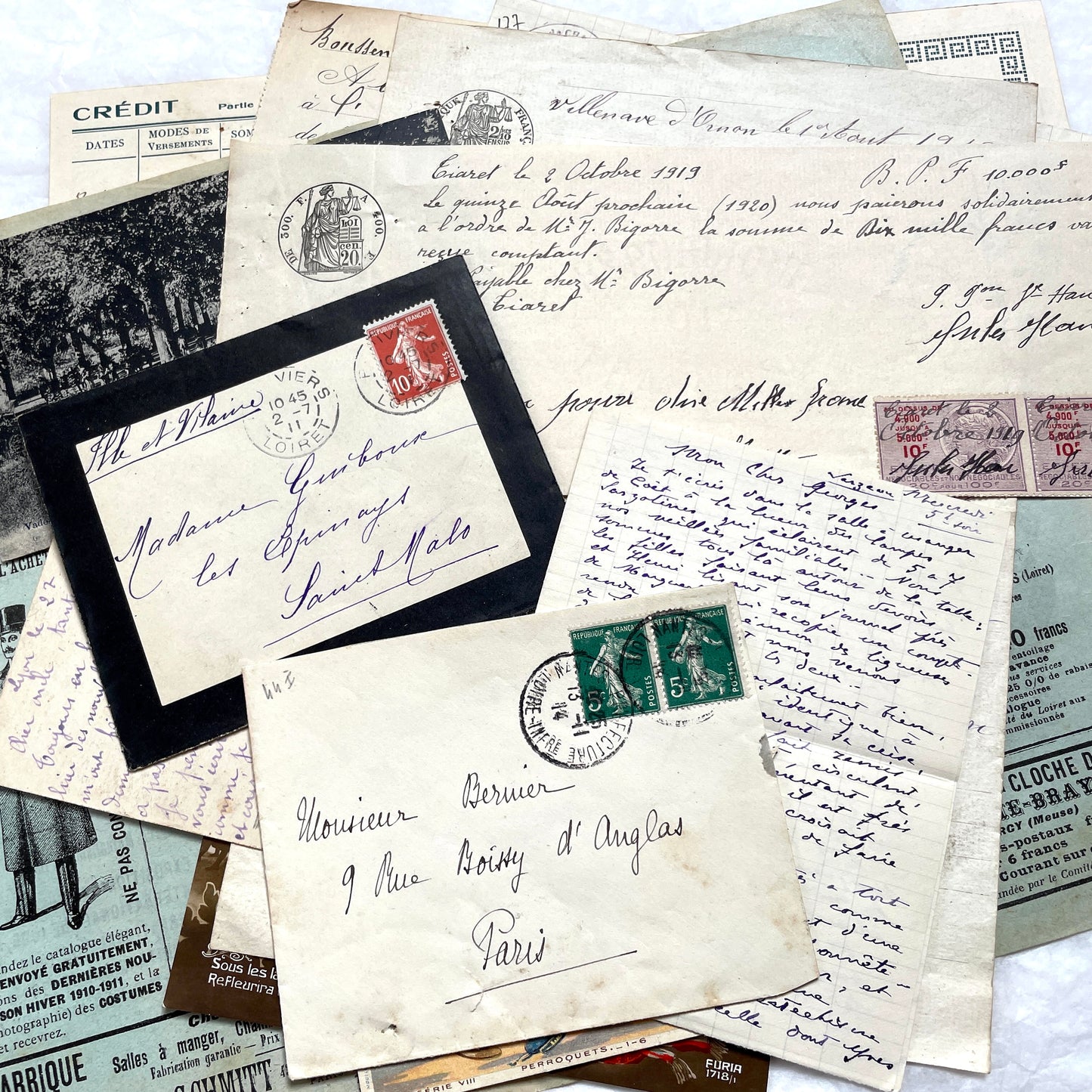 1910s French ephemera lot featuring vintage letters, postcards, bank documents, and photographs from France.