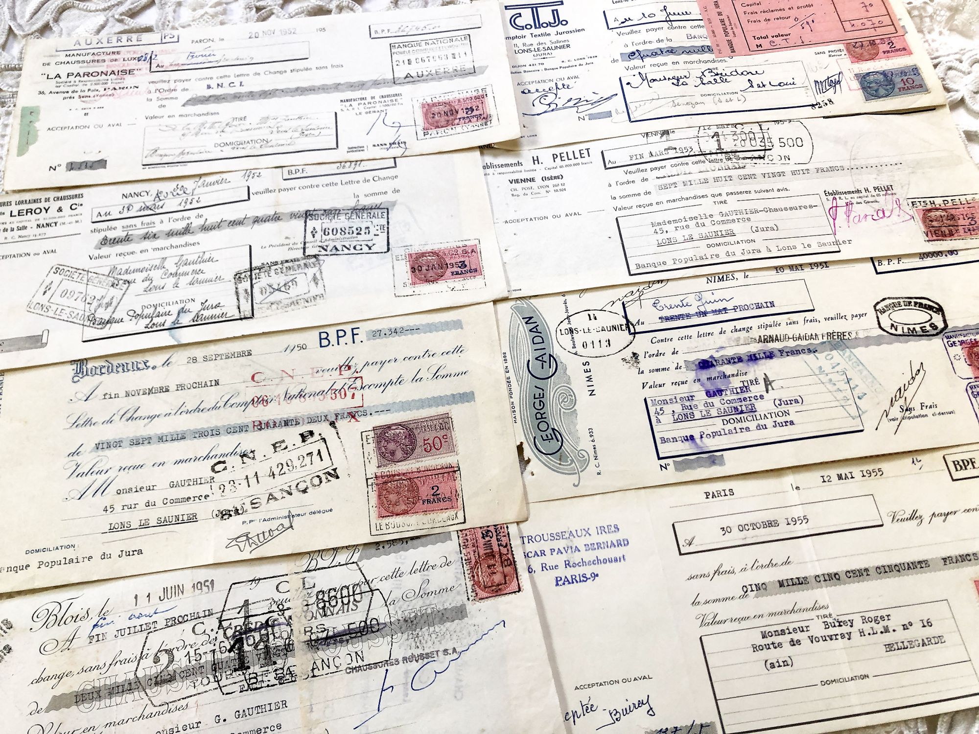 Set of 8 French bills of exchange from 1950s with tax stamps and rubber-stamps