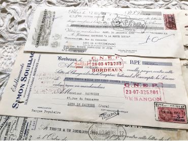 Set of 8 French bills of exchange from 1950s with tax stamps and rubber-stamps