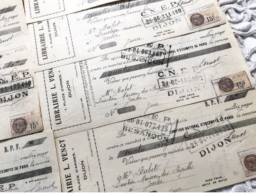 Set of 10 French bills of exchange a bookshop of the city of Dijon from 1930s with tax stamps and rubber-stamps