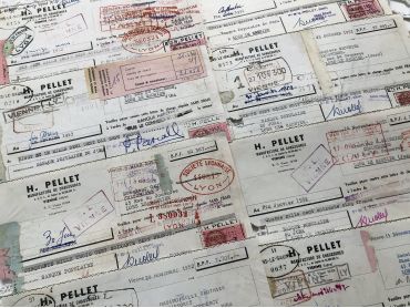 Set of 8 French bills of exchange of a shoe factory from 1950s with tax stamps and rubber-stamps