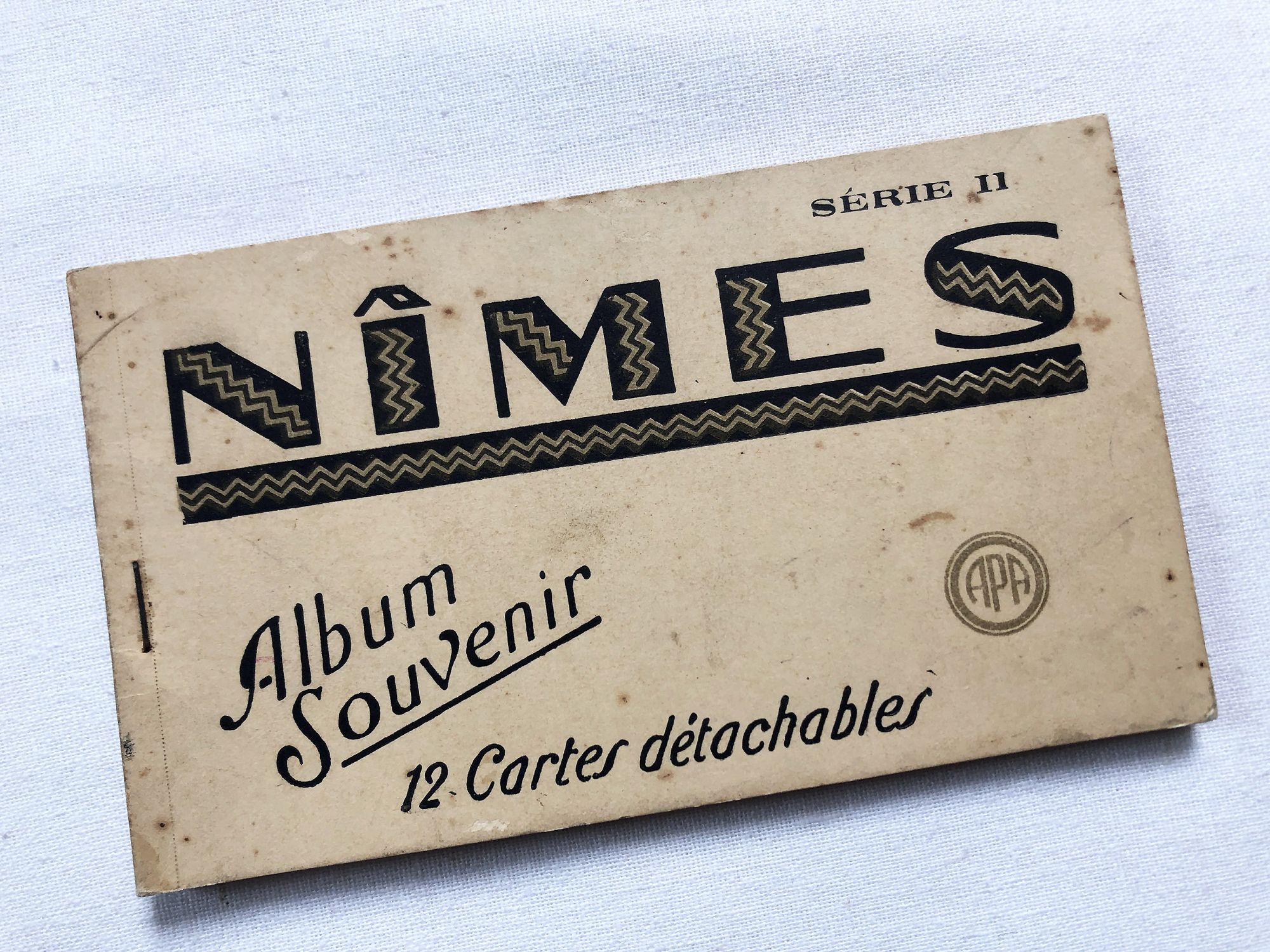 Booklet of 12 vintage postcards of the city of Nimes by French editor André Poux in the 1950s