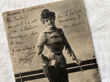 Vintage French postcard with a young woman squire from 1904