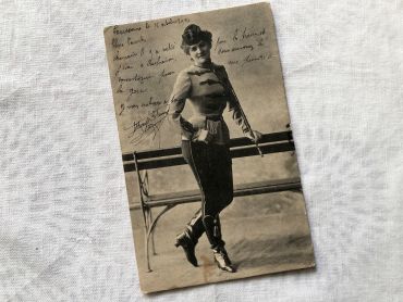 Vintage French postcard with a young woman squire from 1904