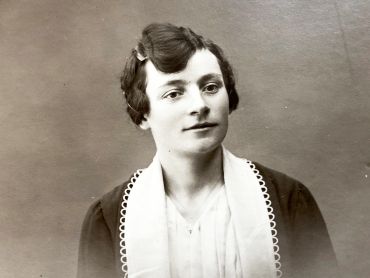 Old French photograph of a young woman of the middle class made