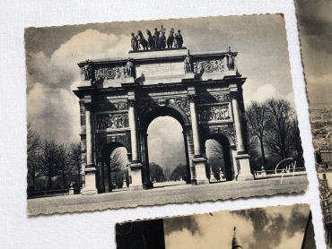 Set of 4 Vintage French postcards of Paris from 1950s with Notre-Dame, the Sacré-Coeur and the Carroussel du Louvre.