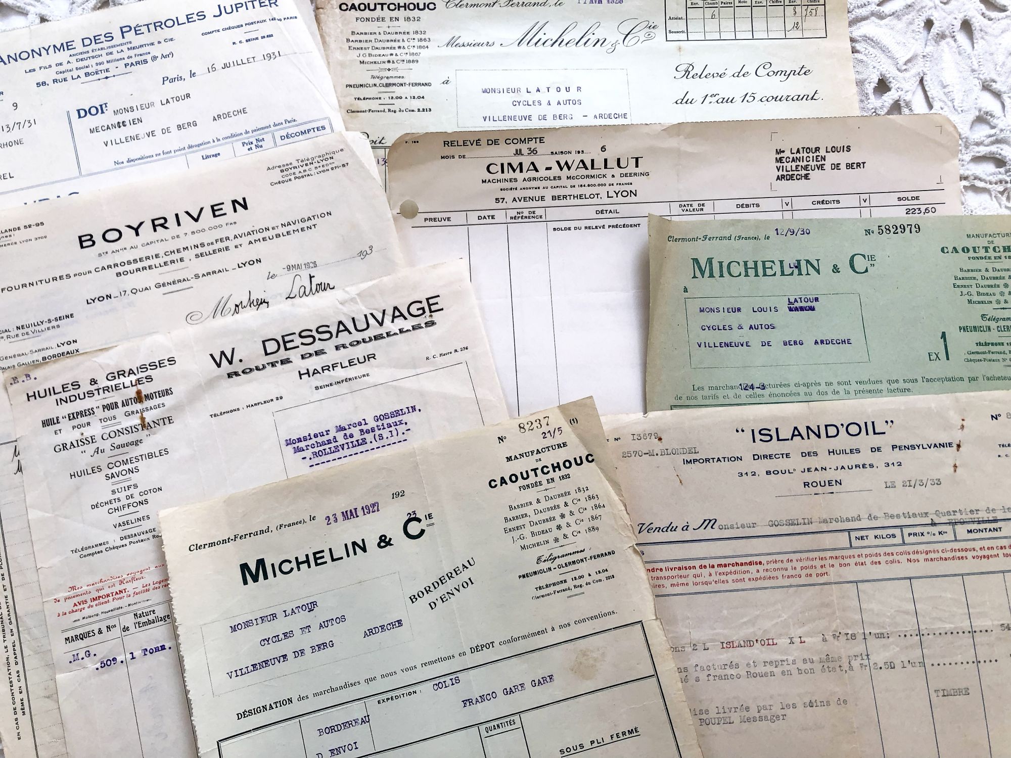 8 French invoices with headings related to vehicle maintenance (gasoline, tires, etc.) from 1920s and 1930s