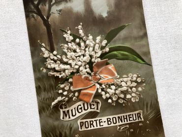 Vintage French postcard with a bouquet of lily of the valley from 1920s