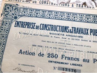 French bearer share of 250 francs from 1930s of a construction and public works company in the north of France in Arras.
