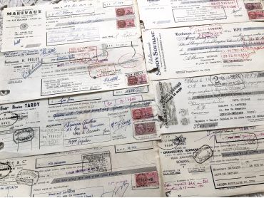 8 French bills of exchange from 1950s with tax stamps and rubber-stamps