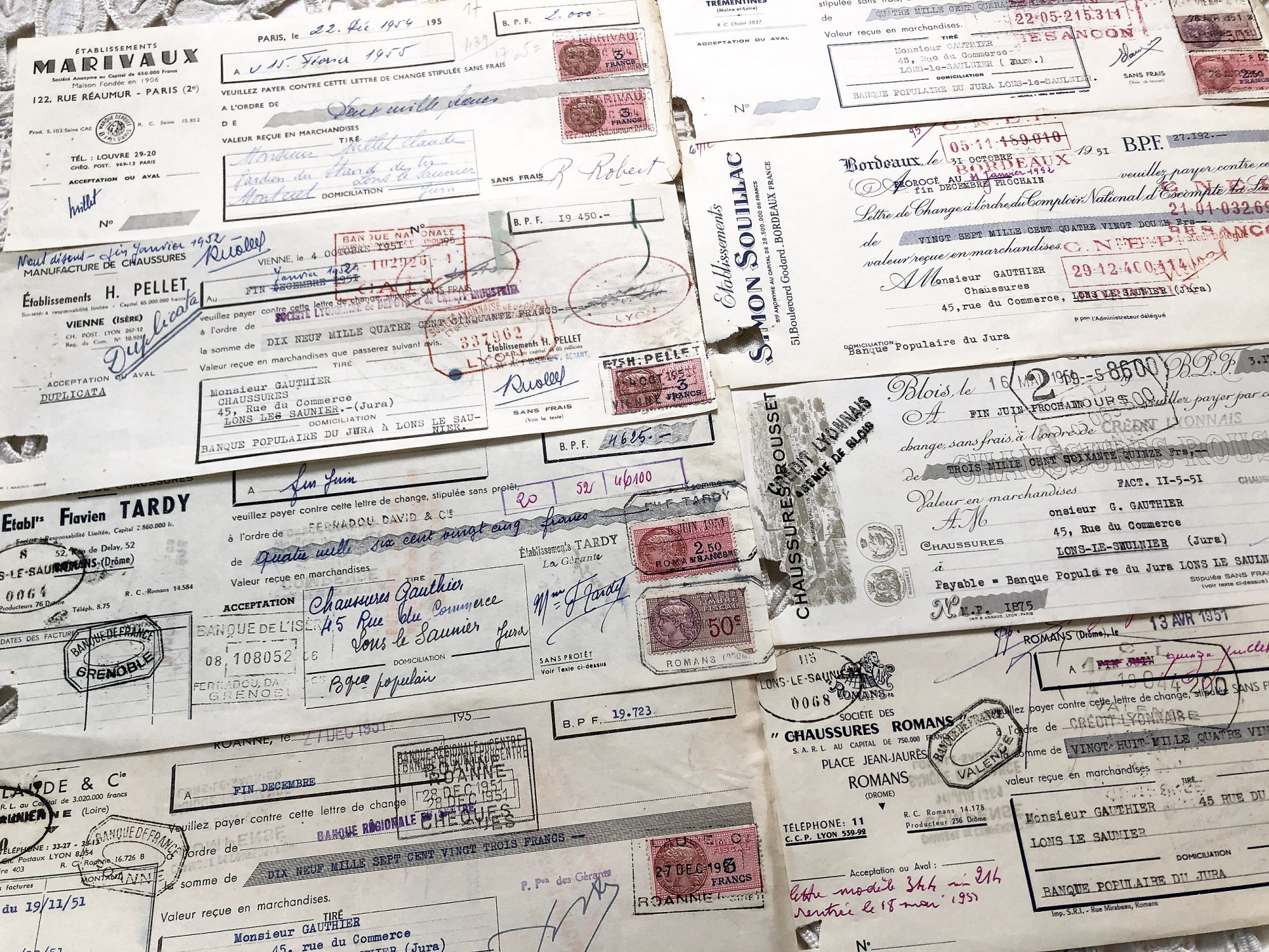 8 French bills of exchange from 1950s with tax stamps and rubber-stamps