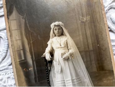 copy of Old French photograph a young girl on the day of her First Communion in 1900s