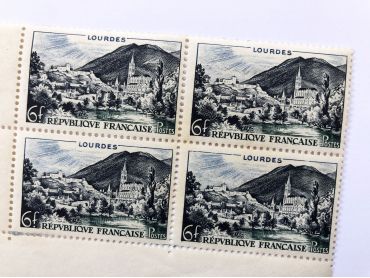 Block of 4 old French stamps representing the Sanctuary of Our Lady of Lourdes