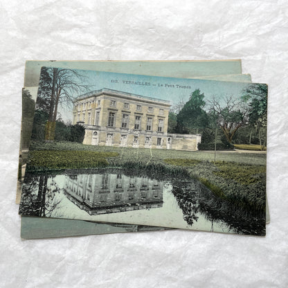 1910s French postcards lot featuring Versailles Palace, Petit Trianon, and grand fountains like Latona and Apollo's Basin.