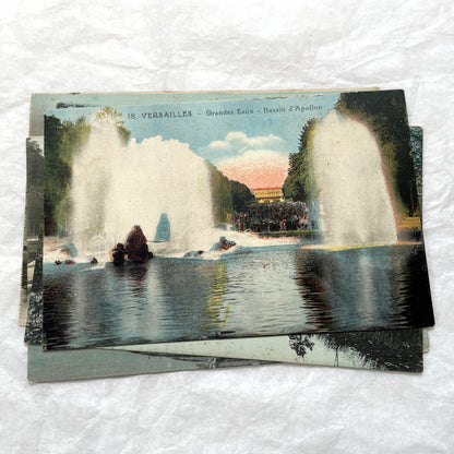 1910s French postcards lot featuring Versailles Palace, Petit Trianon, and grand fountains like Latona and Apollo's Basin.