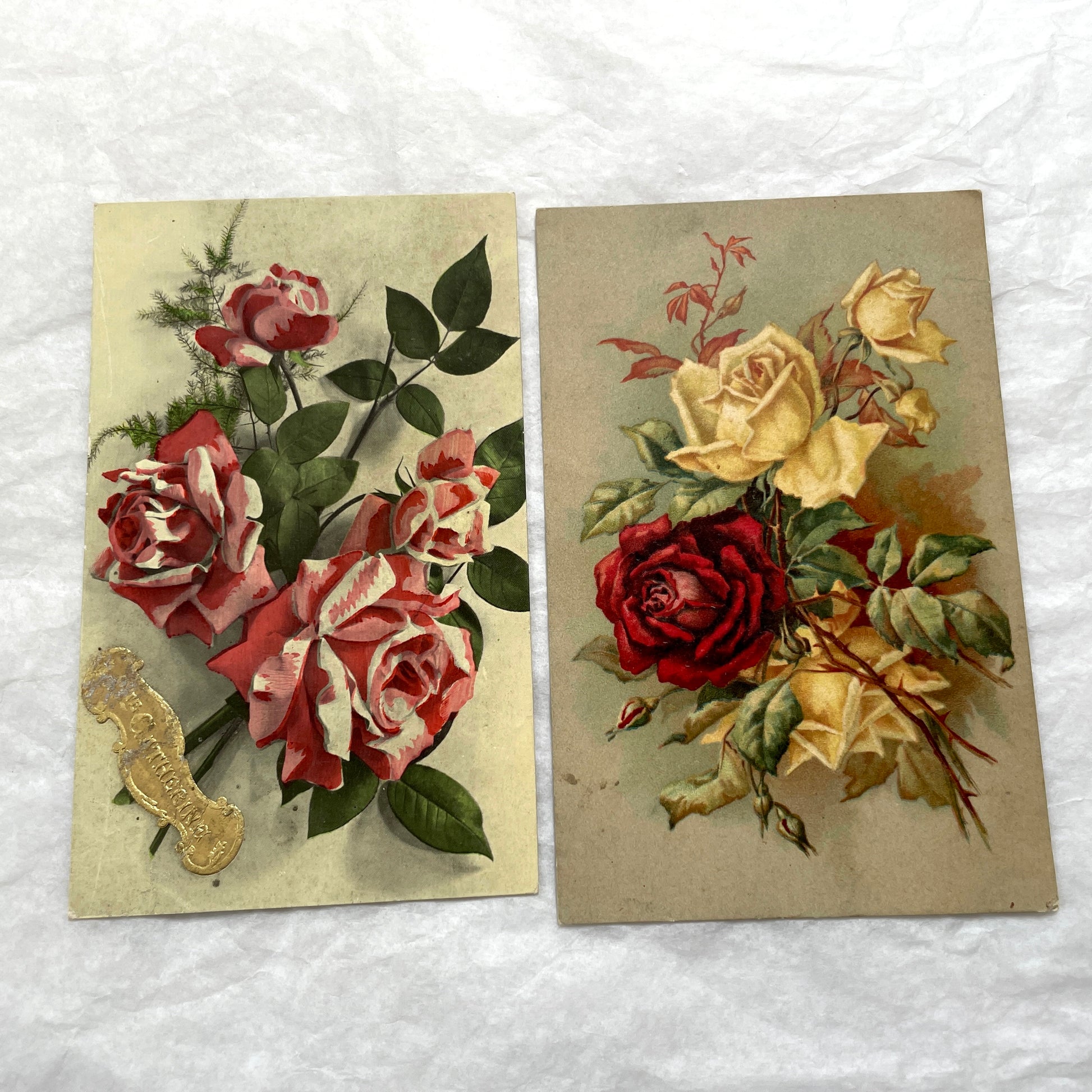 1900s antique postcard lot with French floral design, featuring red, pink, and yellow roses. Vintage paper ephemera.