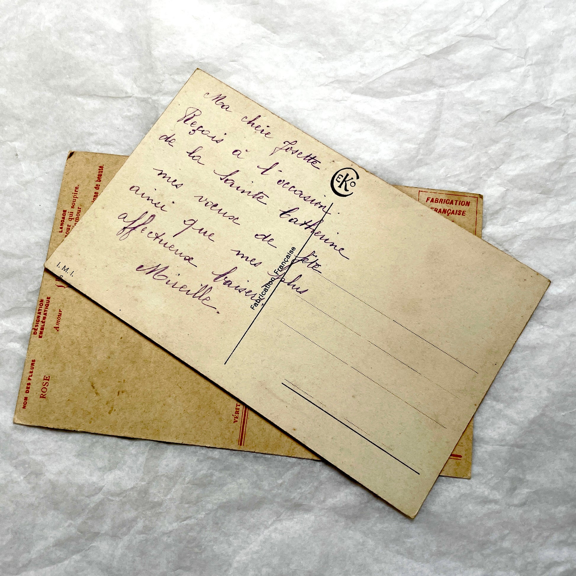 1900s antique postcard lot with French floral design, featuring red, pink, and yellow roses. Vintage paper ephemera.