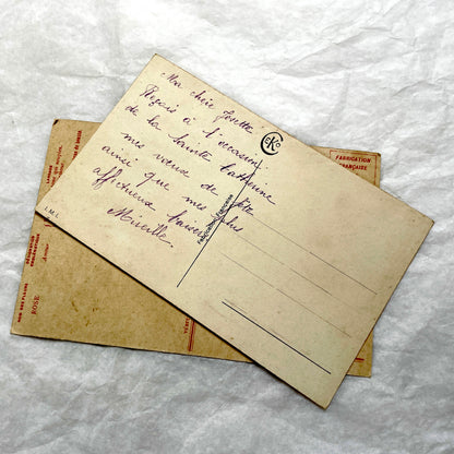 1900s antique postcard lot with French floral design, featuring red, pink, and yellow roses. Vintage paper ephemera.