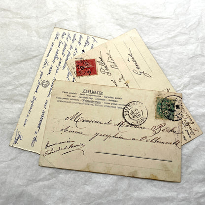 1900s French postcards lot featuring vibrant pansy floral designs and French greetings.