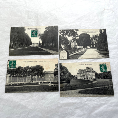 Lot of four 1910s French postcards showing black and white photographs of châteaux and grand estates in France.