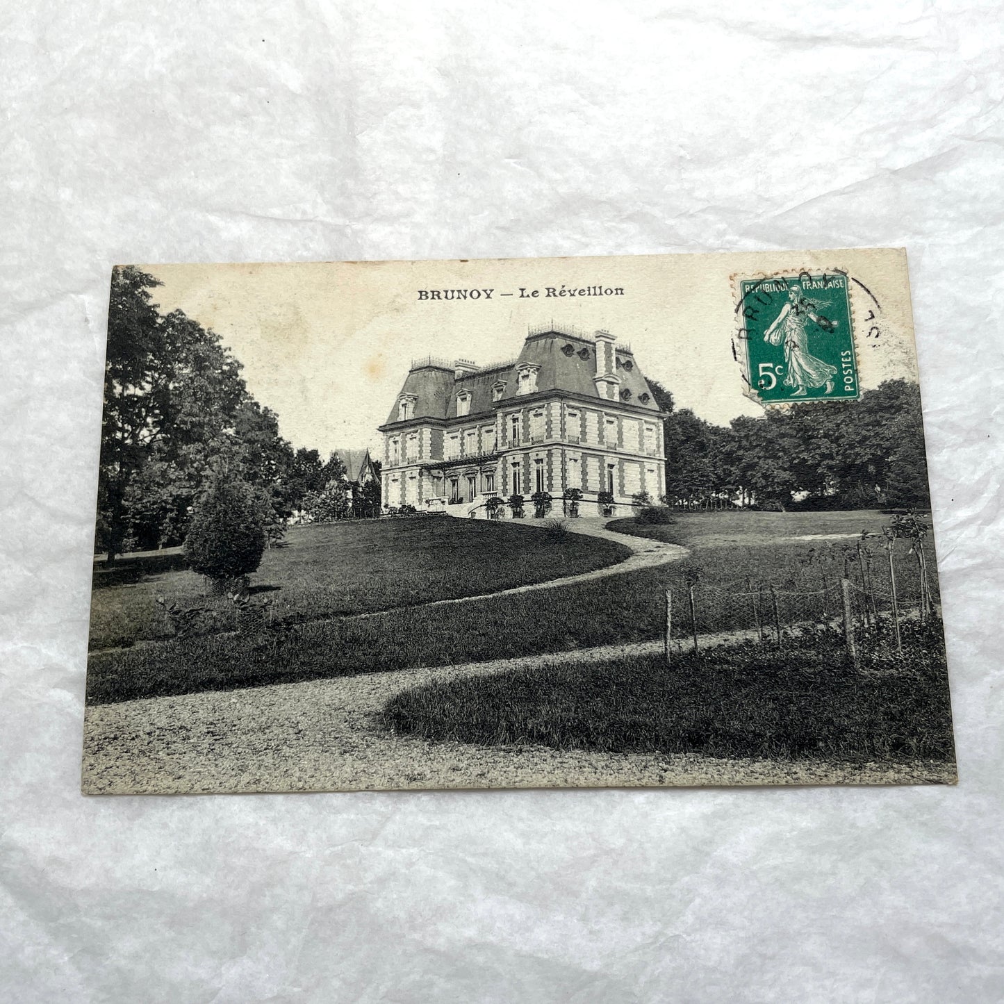 Lot of four 1910s French postcards showing black and white photographs of châteaux and grand estates in France.
