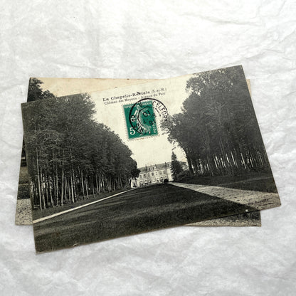 Lot of four 1910s French postcards showing black and white photographs of châteaux and grand estates in France.