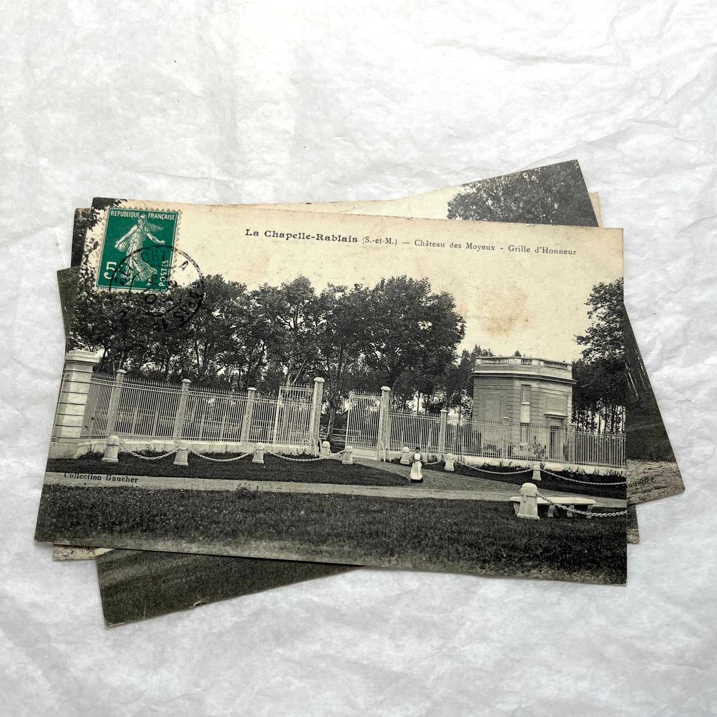 Lot of four 1910s French postcards showing black and white photographs of châteaux and grand estates in France.