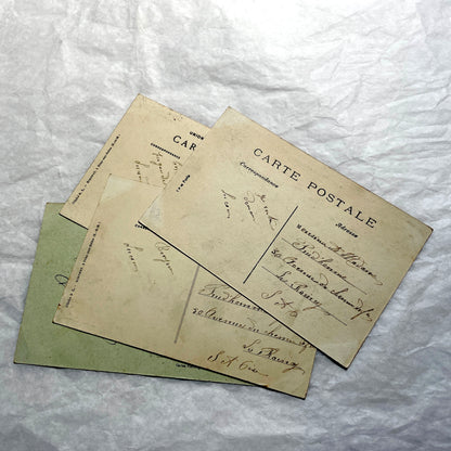Lot of four 1910s French postcards showing black and white photographs of châteaux and grand estates in France.