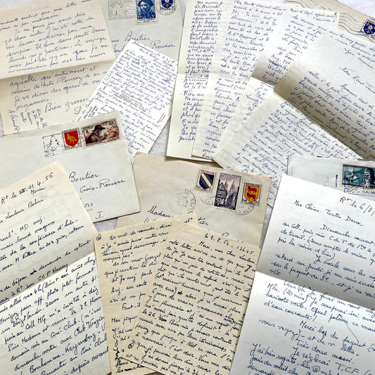 Set of 5 French handwritten letters with envelopes from the 1950s, featuring blue ink script and vintage postage stamps.