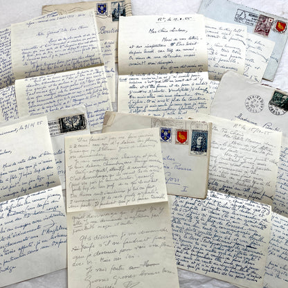 Set of 1950s French handwritten letters and envelopes with stamps. Vintage paper ephemera for collectors.