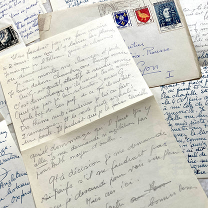 Set of 1950s French handwritten letters and envelopes with stamps. Vintage paper ephemera for collectors.