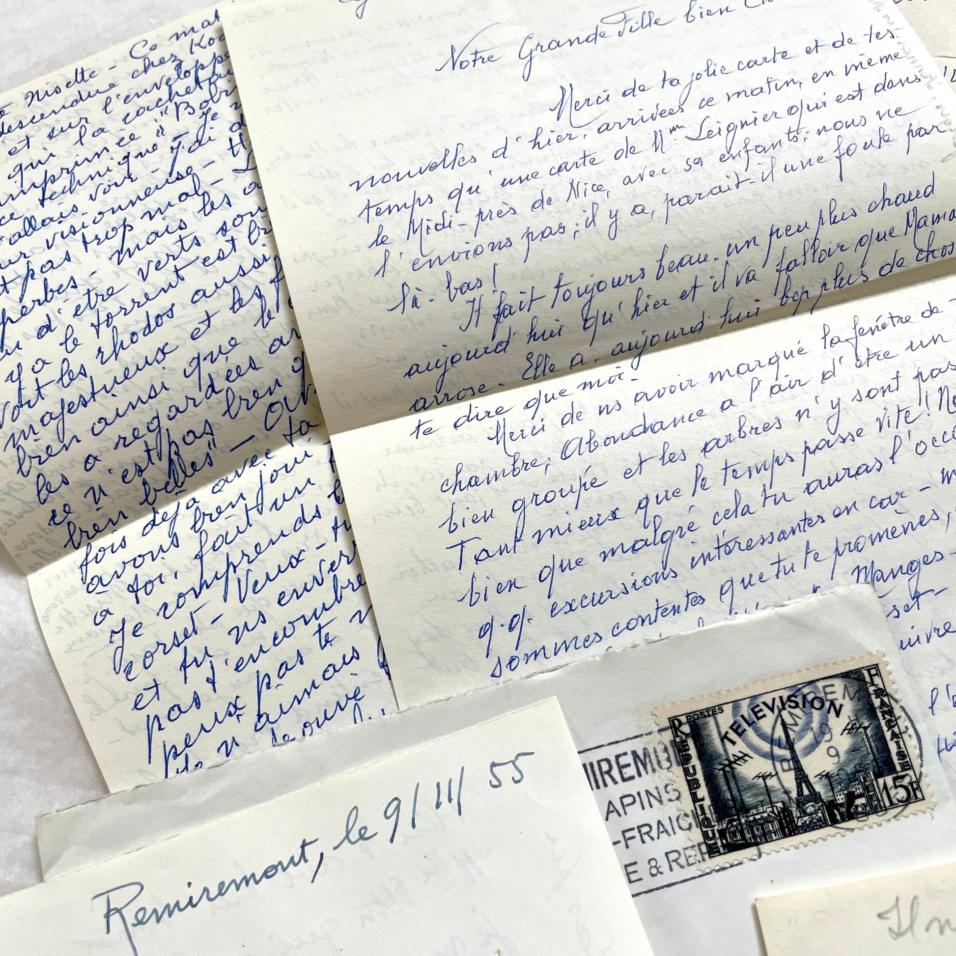 Set of 1950s French handwritten letters and envelopes with stamps. Vintage paper ephemera for collectors.