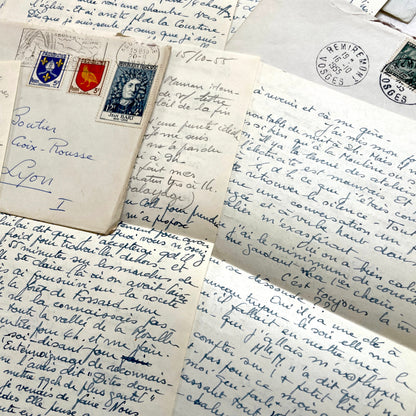 Set of 1950s French handwritten letters and envelopes with stamps. Vintage paper ephemera for collectors.
