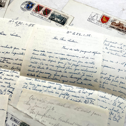 Set of 5 1950s French handwritten letters with envelopes and postage stamps, vintage paper ephemera.