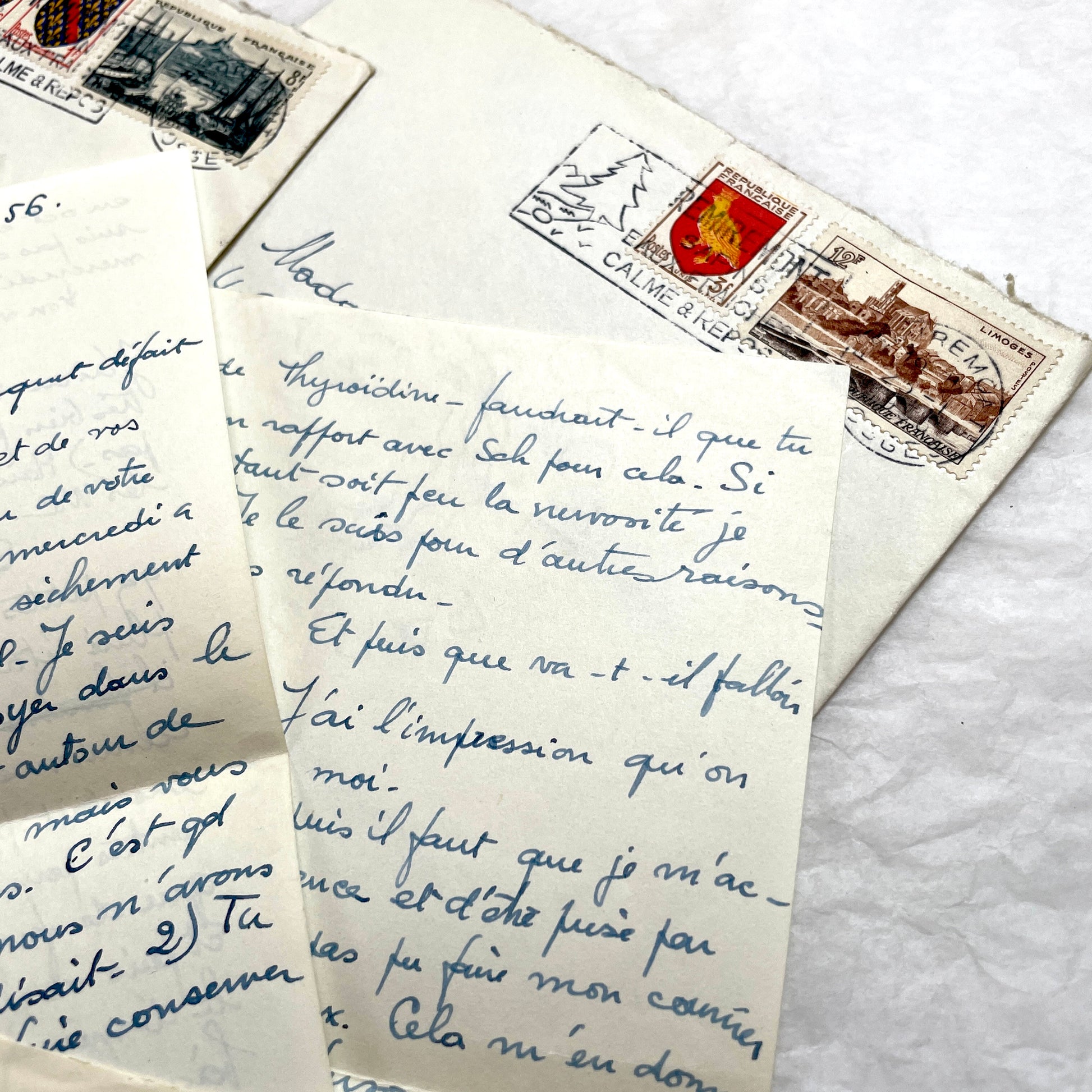 Set of 5 1950s French handwritten letters with envelopes and postage stamps, vintage paper ephemera.