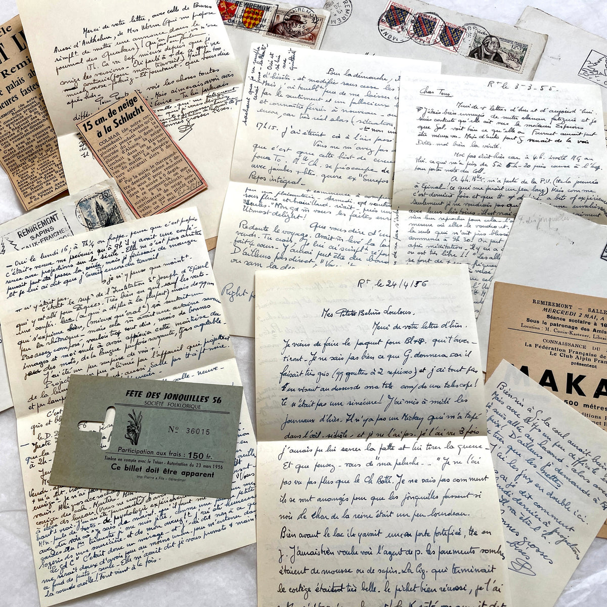 1950s French handwritten letters set with envelopes, vintage stamps, and cursive script ephemera.