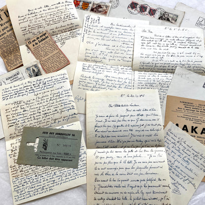 1950s French handwritten letters set with envelopes, vintage stamps, and cursive script ephemera.