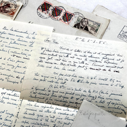 1950s French handwritten letters set with envelopes, vintage stamps, and cursive script ephemera.