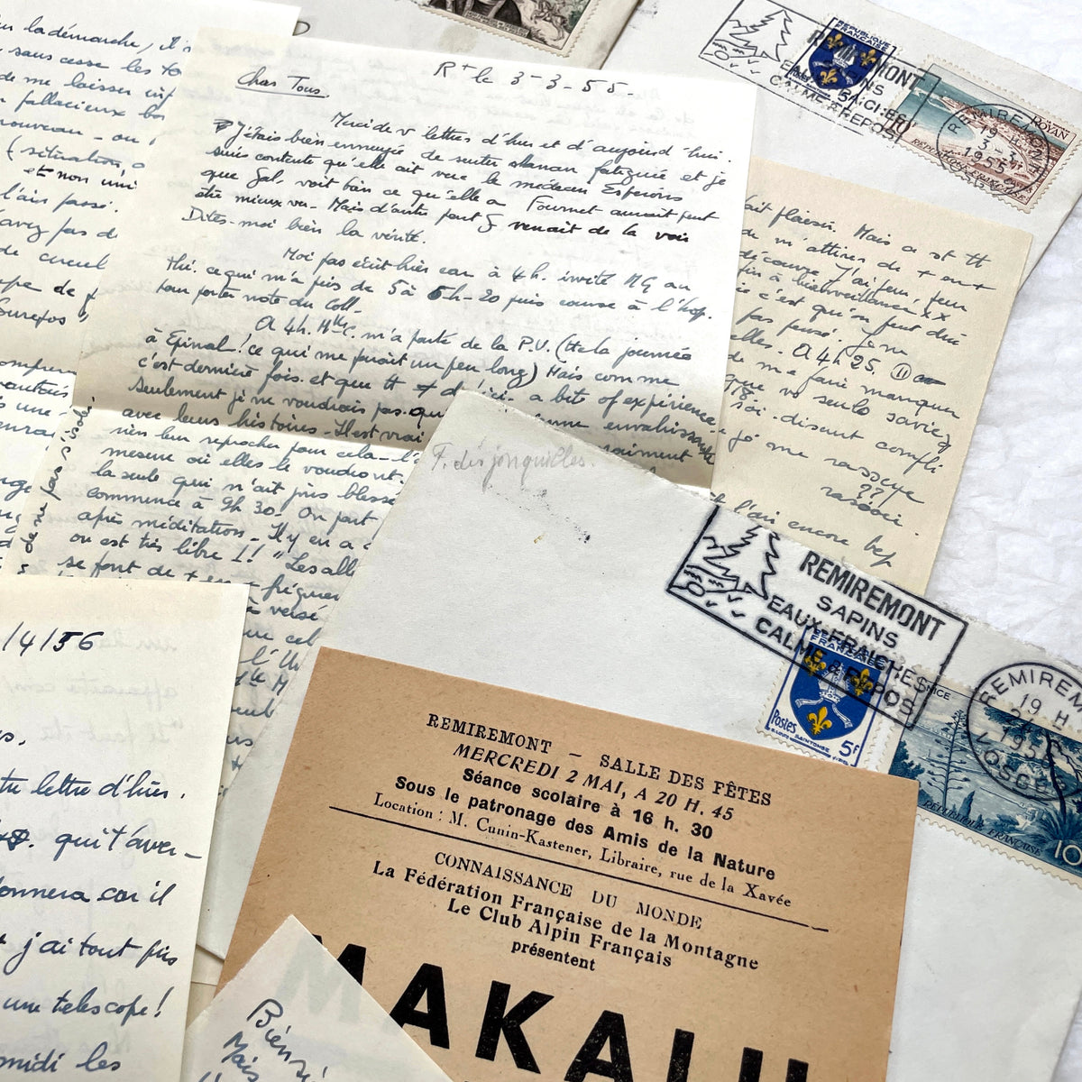 1950s French handwritten letters set with envelopes, vintage stamps, and cursive script ephemera.